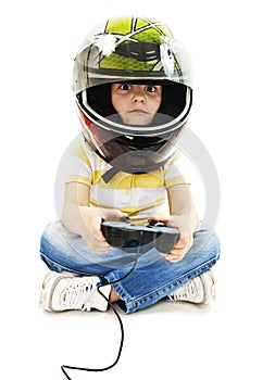 Boy with a helmet, using video game controller