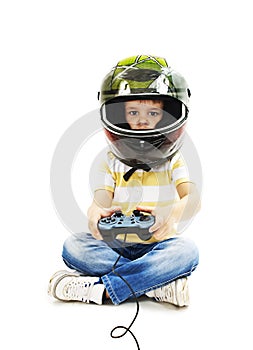 Boy with a helmet, using video game controller