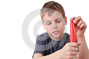 Boy hides shawl in fist is focus