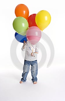 Boy Is Hiding Behind Balloons