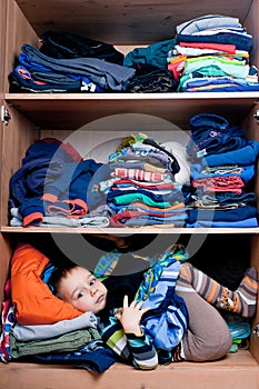 boy hiding in the closet