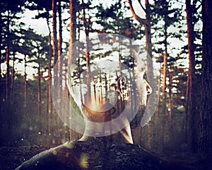 Boy with himself in mind in a forest. Double exposure