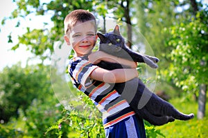 Boy and his pet cat