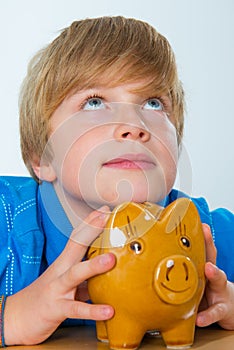 Boy and his piggybank