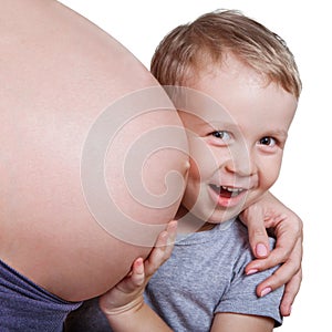 Boy and his pregnant mother