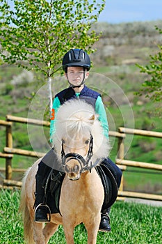 Boy and his Shetland pony