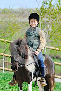 Boy and his Shetland pony