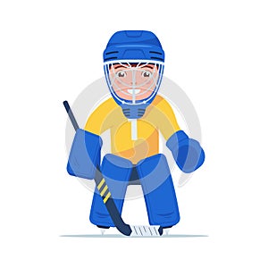 Boy hockey player is standing in goalie uniform