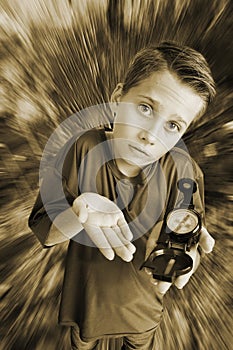 Boy hold a compass monochrome