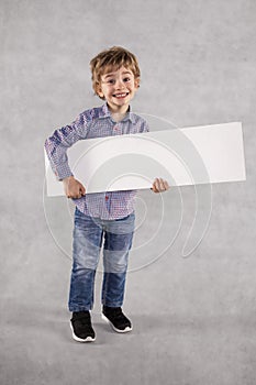 Boy of holding an advertising space, young businessman with copy