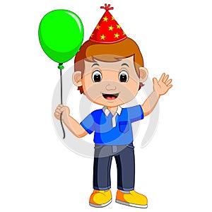 Boy holding balloons