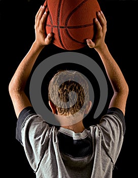 Boy holding basketball