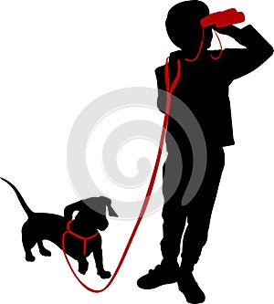 Boy holding binoculars and his dog silhoutte