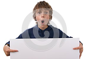 Boy holding blank white sign