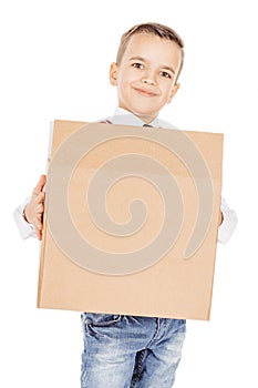 Boy holding card boxes against on white studio background.