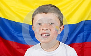 Boy holding an Colombian flag