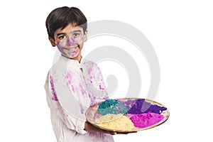 Boy holding color plate