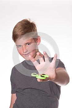 Boy holding fidget spinner