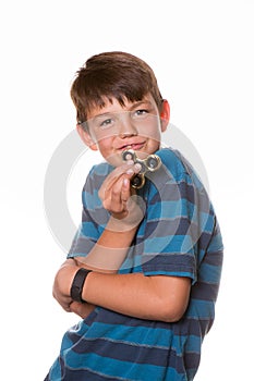 Boy holding fidget spinner photo