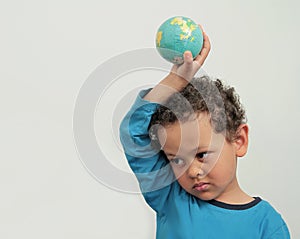 Boy holding a globe stock photo