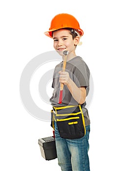 Boy holding hammer and tools box