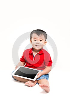 Boy holding ipad