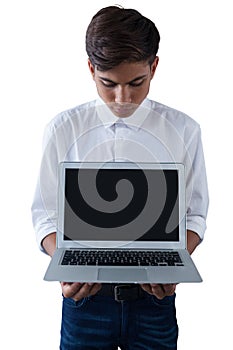 Boy holding laptop