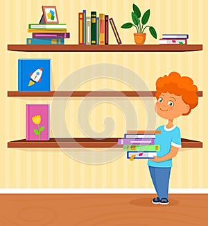 Boy holding many books