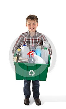 Boy holding recycling bin full or rubbish