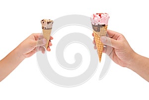 Boy holding a small ice cream cone and man holding a big one with clipping-path