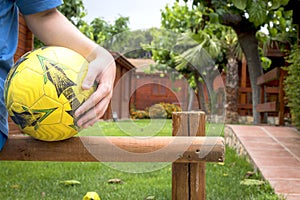 Boy holding a soccer ball