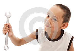 Boy holding spanner