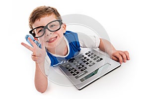 Boy Holding Up Three Fingers and a Big Calculator.