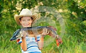 Boy holds big fish