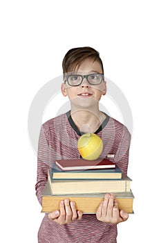 Boy holds stack of books