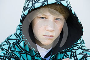 Boy in Hood Looking to Camera