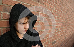 Boy in hooded top