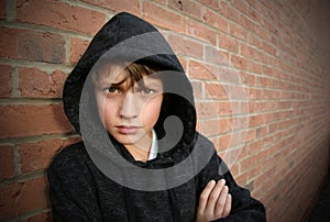 Boy in hooded top