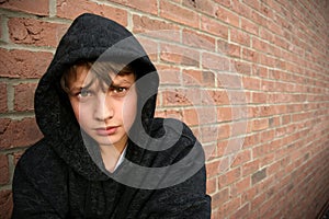 Boy in hooded top