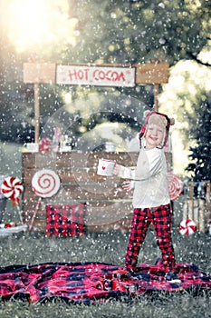 Boy with hot cocoa stand