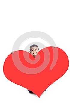 Boy with a huge heart cutout