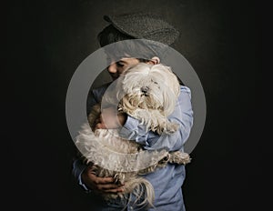 Boy hugging his dog