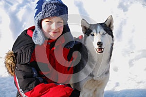 Boy with husky dog