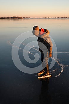 Boy ice skating