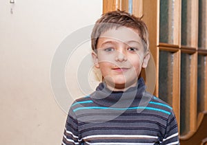 Boy indoors door