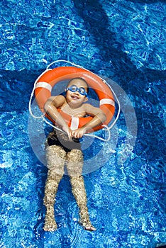 Boy in inflatable ring