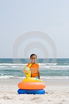 Boy with inflatable rings