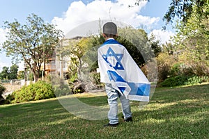 Boy with Israeli Flag in Park.