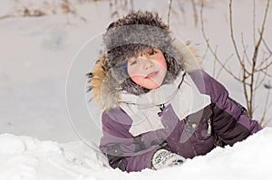 Boy in jacket walking in winter, ice skating,