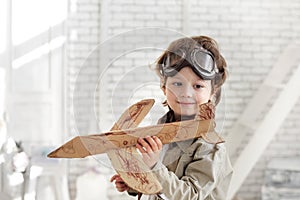 boy with jet airplane in hand